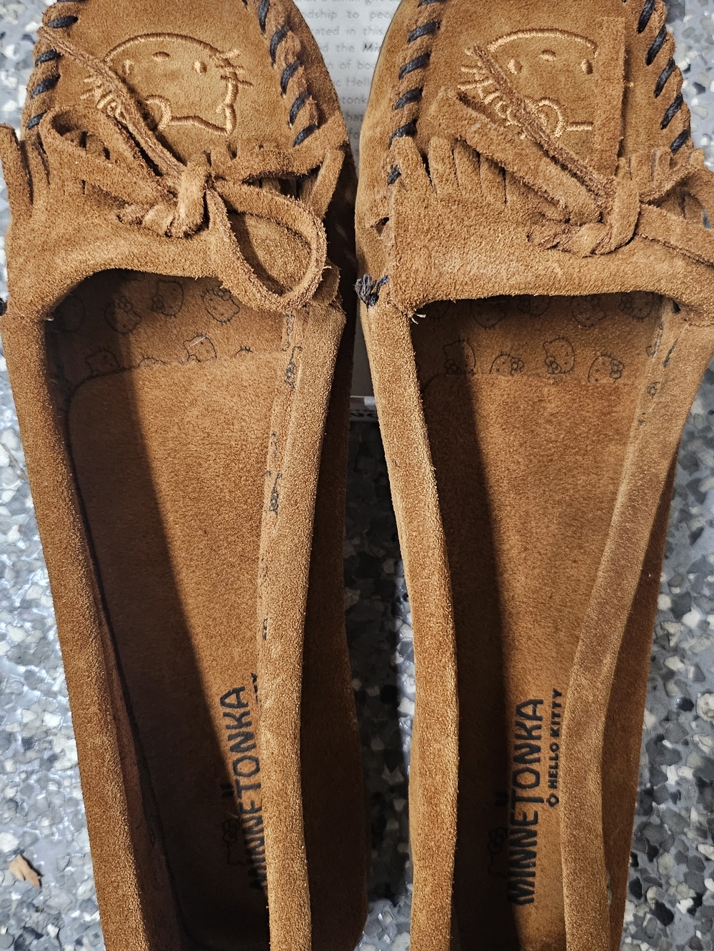 Hello Kitty Minnetonka Women’s Suede Moccasin Flats in Brown